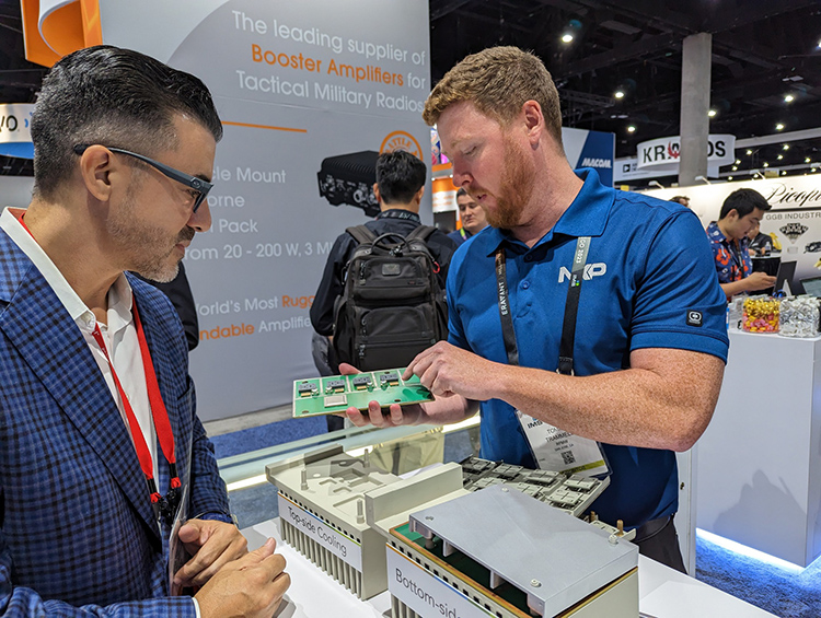 Tommy Trammell presents a Top-side and Bottom-side Cooling demo at the RFMW IMS 2023 booth, highlighting advanced solutions from NXP Semiconductors.